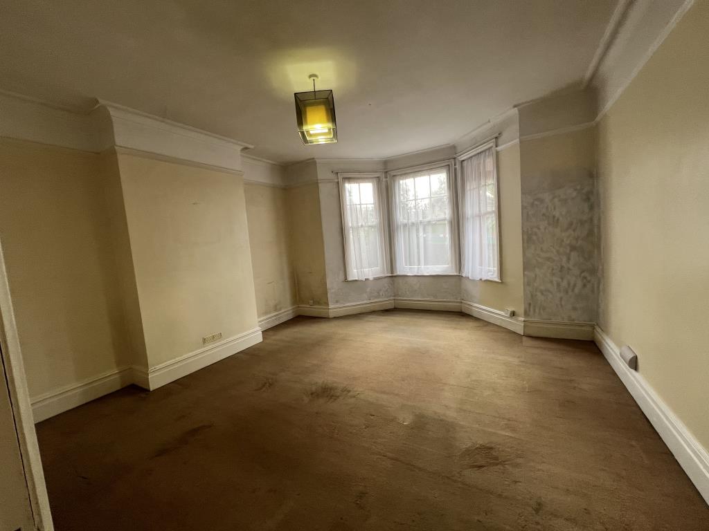 Lot: 102 - TWO-BEDROOM FLAT FOR REFURBISHMENT - General view of living room